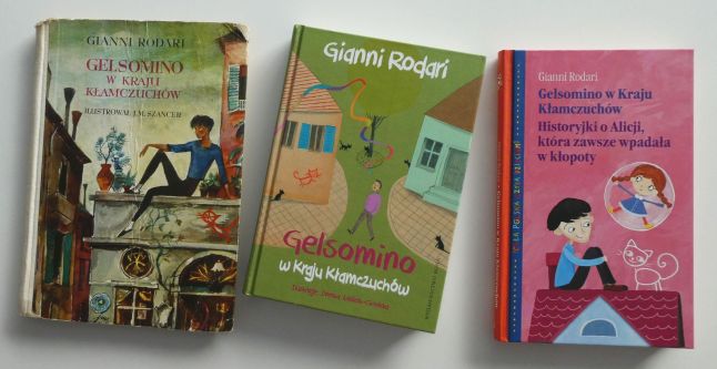 Na szarym tle okładki trzech różnych wydań książki pt. „Gelsomino w Kraju Kłamczuchów”