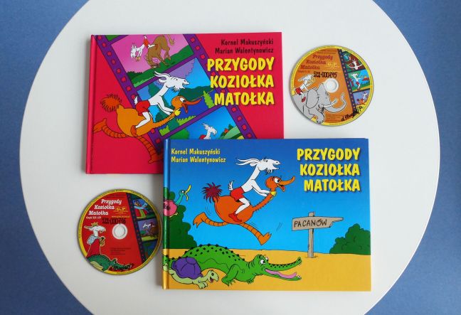 Na białym tle okładki dwóch książek i płyt CD „Przygody Koziołka Matołka” wydanych przez Oficynę Wydawniczą G&P.
